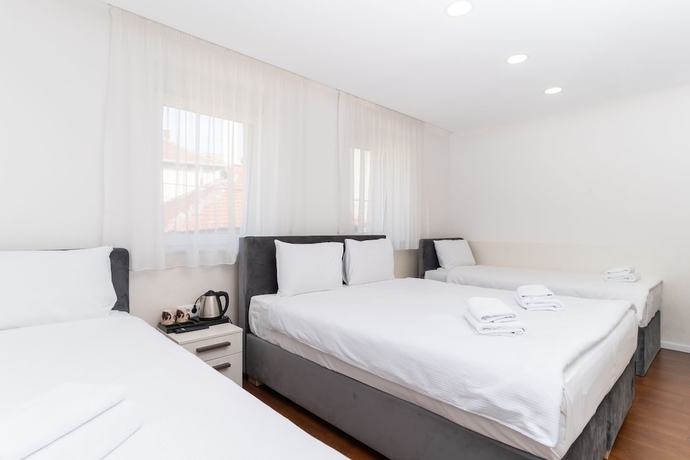 Imagen de la habitación del Hotel Ornament and Apartments. Foto 16