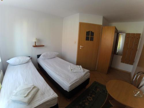 Imagen de la habitación del Hotel Ośrodek Wypoczynkowy Merkury. Foto 2