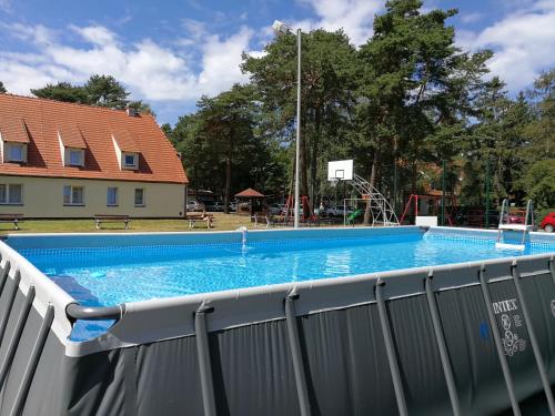 Imagen de la piscina del Hotel Ośrodek Wypoczynkowy Merkury. Foto 8