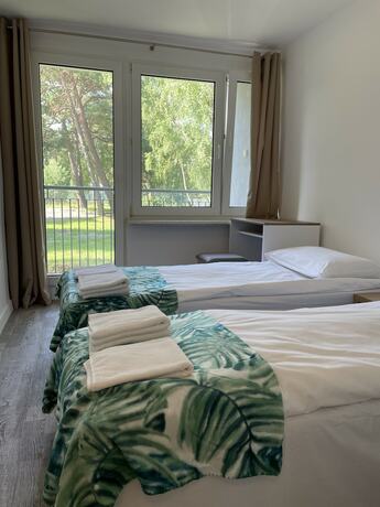 Imagen de la habitación del Hotel Ośrodek Wypoczynkowy Neptun. Foto 13