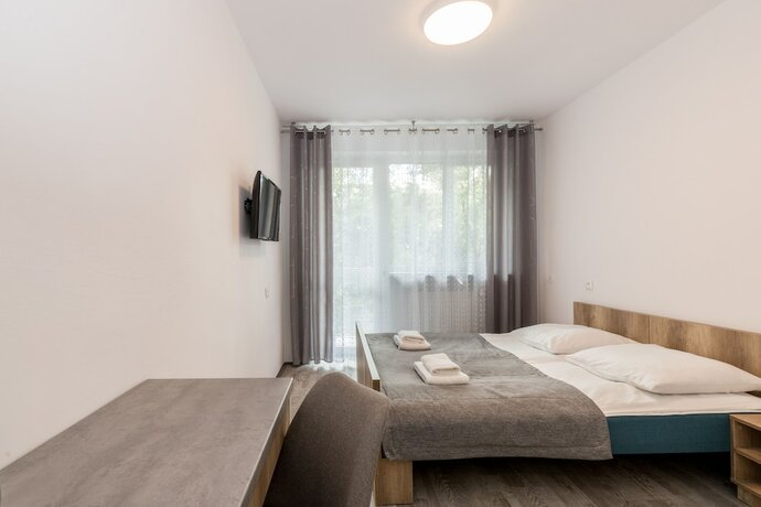 Imagen de la habitación del Hotel Ośrodek Wypoczynkowy Neptun. Foto 16