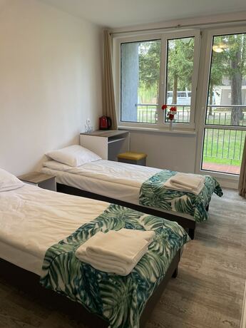 Imagen de la habitación del Hotel Ośrodek Wypoczynkowy Neptun. Foto 17