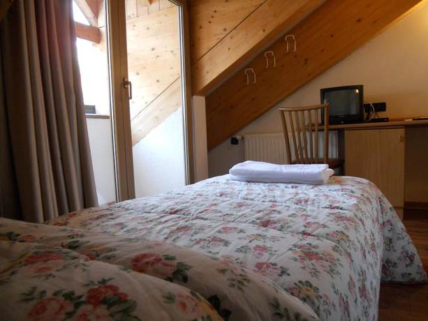 Imagen de la habitación del Hotel Orsa Maggiore, Falcade. Foto 6
