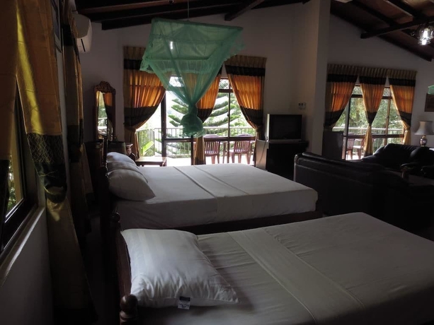 Imagen de la habitación del Hotel Oruthota Chalets. Foto 9