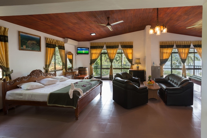 Imagen de la habitación del Hotel Oruthota Chalets. Foto 13