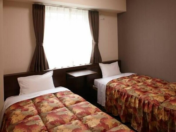 Imagen de la habitación del Hotel Osaka Academia. Foto 13