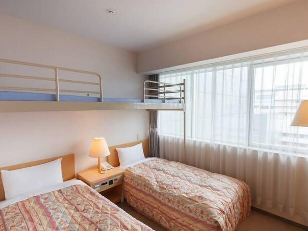 Imagen de la habitación del Hotel Osaka Academia. Foto 14