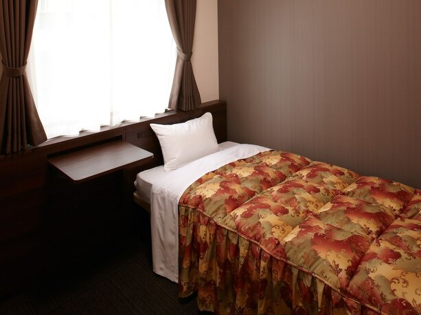 Imagen de la habitación del Hotel Osaka Academia. Foto 23