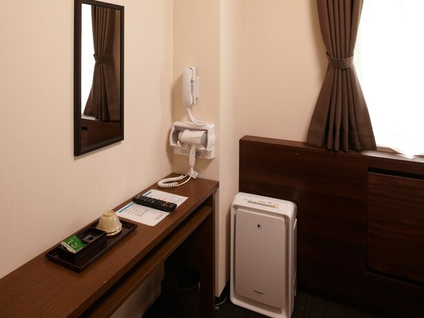 Imagen de la habitación del Hotel Osaka Academia. Foto 28