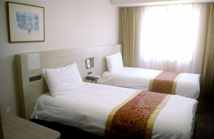 Imagen de la habitación del Hotel Osaka Bay Plaza. Foto 21