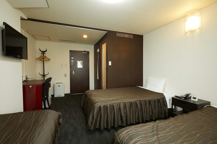 Imagen de la habitación del Hotel Osaka Corona. Foto 10