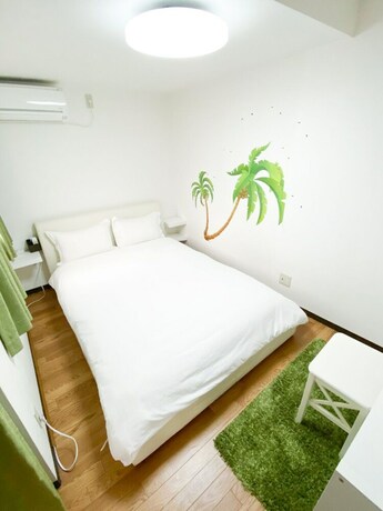Imagen de la habitación del Hotel Osaka Nipponbashi Family House. Foto 20