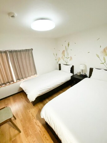 Imagen de la habitación del Hotel Osaka Nipponbashi Family House. Foto 21