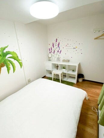 Imagen de la habitación del Hotel Osaka Nipponbashi Family House. Foto 22