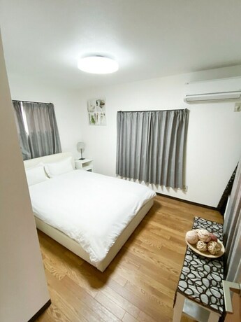 Imagen de la habitación del Hotel Osaka Nipponbashi Family House. Foto 24