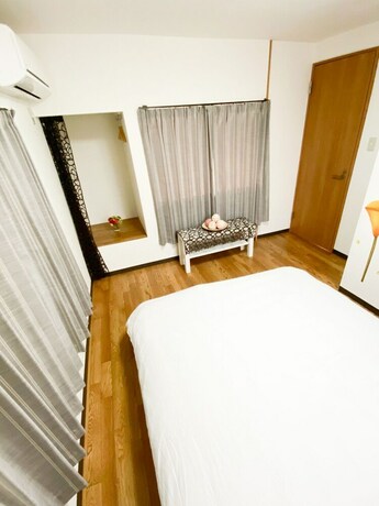 Imagen de la habitación del Hotel Osaka Nipponbashi Family House. Foto 26