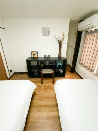 Imagen de la habitación del Hotel Osaka Nipponbashi Family House. Foto 27