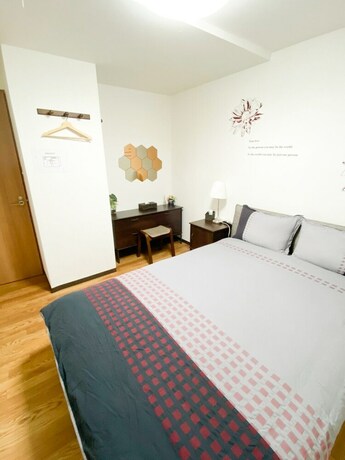 Imagen de la habitación del Hotel Osaka Nipponbashi Family House. Foto 30