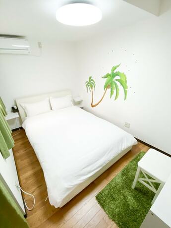 Imagen de la habitación del Hotel Osaka Nipponbashi Family House. Foto 35