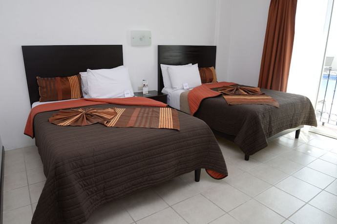 Imagen de la habitación del Hotel Osalle Inn. Foto 4