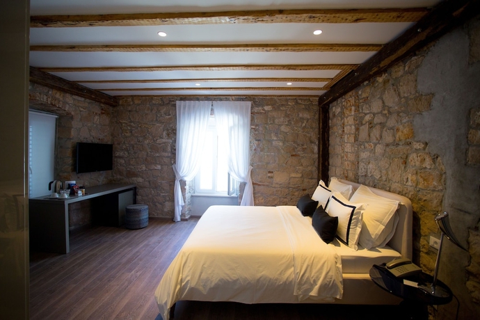 Imagen de la habitación del Hotel Osam. Foto 15