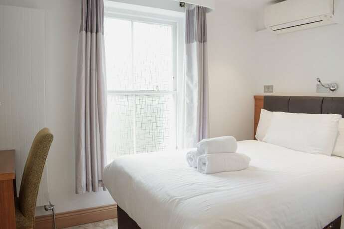 Imagen de la habitación del Hotel Osborne Apartments. Foto 14