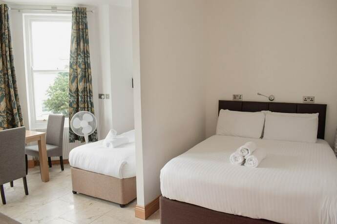 Imagen de la habitación del Hotel Osborne Apartments. Foto 15