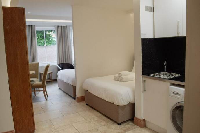 Imagen de la habitación del Hotel Osborne Apartments. Foto 17