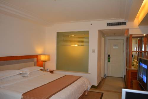 Imagen de la habitación del Hotel Oscar, HAIKOU. Foto 1