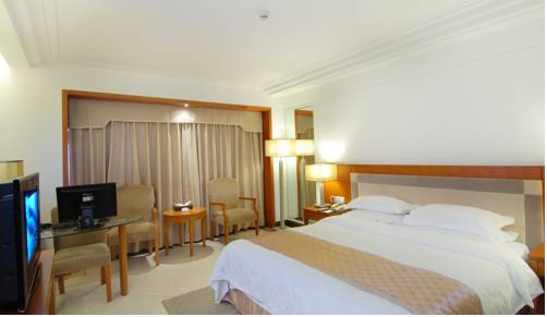 Imagen de la habitación del Hotel Oscar, HAIKOU. Foto 2