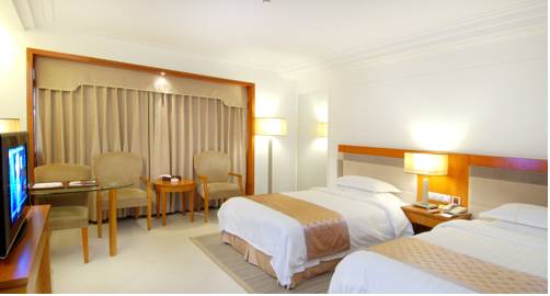 Imagen de la habitación del Hotel Oscar, HAIKOU. Foto 3