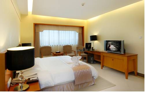 Imagen de la habitación del Hotel Oscar, HAIKOU. Foto 4