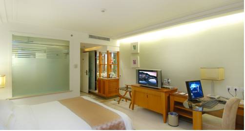 Imagen de la habitación del Hotel Oscar, HAIKOU. Foto 5