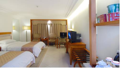 Imagen de la habitación del Hotel Oscar, HAIKOU. Foto 6
