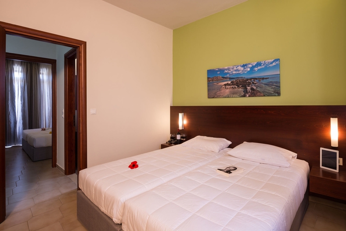 Imagen de la habitación del Hotel Oscar Suites Village. Foto 13