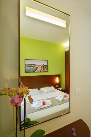 Imagen de la habitación del Hotel Oscar Suites and Village. Foto 5