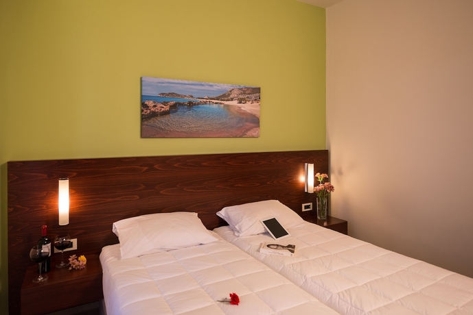 Imagen de la habitación del Hotel Oscar Suites and Village. Foto 13
