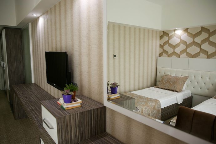 Imagen de la habitación del Hotel Osh Luxury. Foto 4