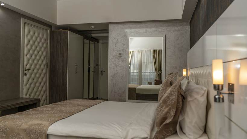 Imagen de la habitación del Hotel Osh Luxury. Foto 6