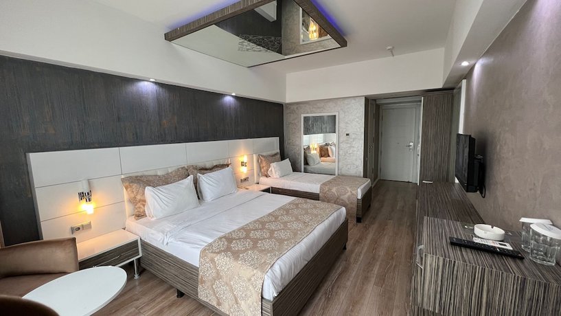Imagen de la habitación del Hotel Osh Luxury. Foto 8