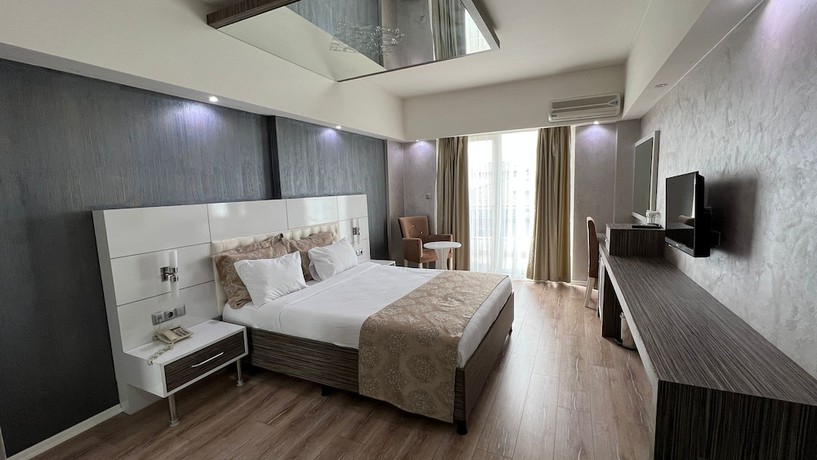 Imagen de la habitación del Hotel Osh Luxury. Foto 11