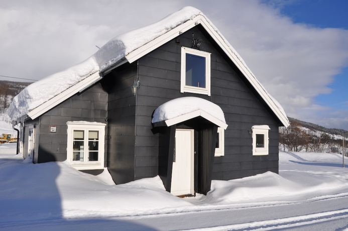 Imagen de la habitación del Hotel Øen Turistsenter Cottages. Foto 11