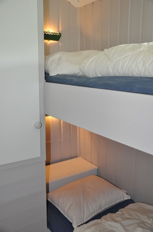 Imagen de la habitación del Hotel Øen Turistsenter Cottages. Foto 14