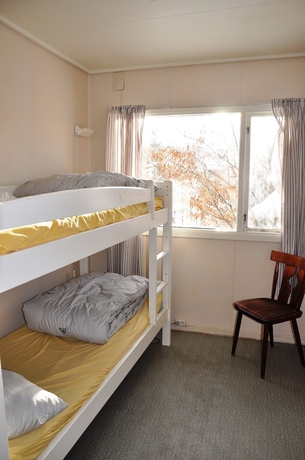 Imagen de la habitación del Hotel Øen Turistsenter Cottages. Foto 19