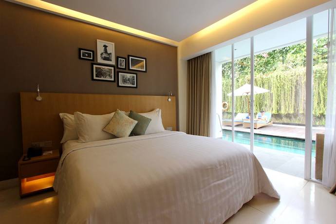 Imagen de la habitación del Hotel Ossotel Legian Bali. Foto 6