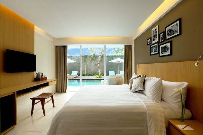 Imagen de la habitación del Hotel Ossotel Legian Bali. Foto 7