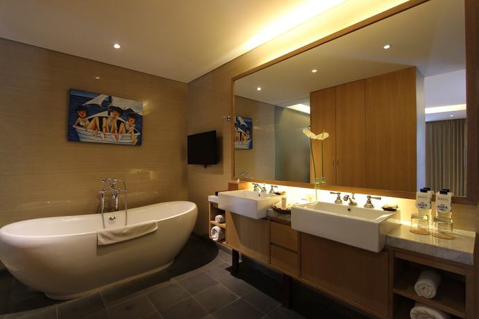 Imagen de la habitación del Hotel Ossotel Legian Bali. Foto 12