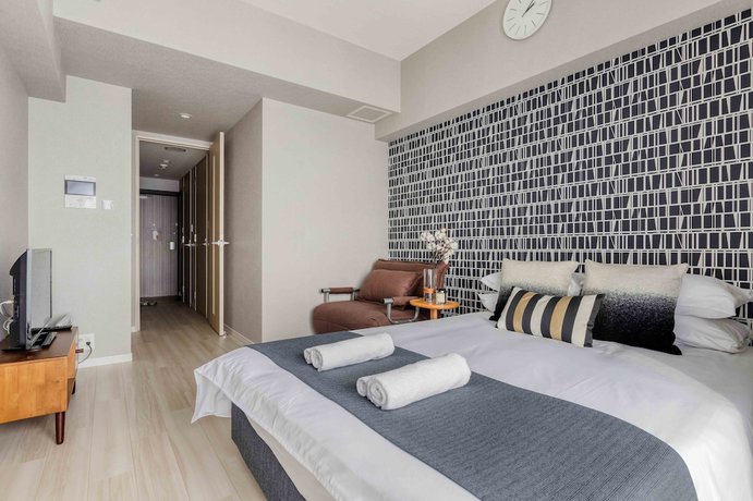 Imagen de la habitación del Hotel Ostay Shin-osaka Apartment. Foto 7