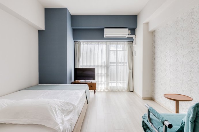 Imagen de la habitación del Hotel Ostay Shin-osaka Apartment. Foto 10