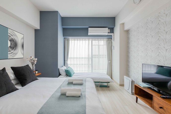 Imagen de la habitación del Hotel Ostay Shin-osaka Apartment. Foto 13